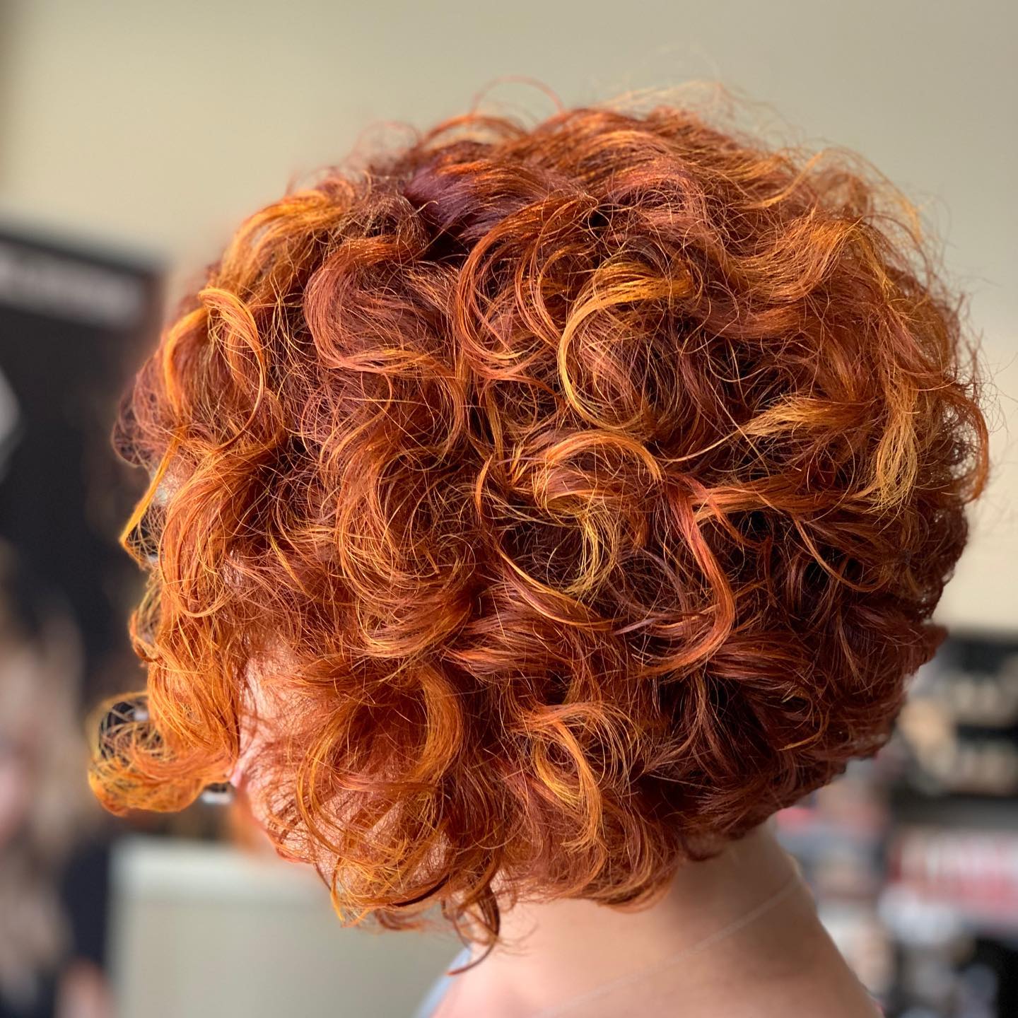Redhead natural curls bright and fun short haircut - Milwaukee's Best Hair Salon - veronica's hair studio